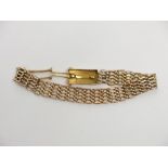 A five bar 15ct gold gate link bracelet with patent deployment 19g.
