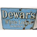 A large Dewar's white label Whisky enamel advertising sign, white letters on a pale blue ground,