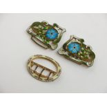 An Art Nouveau enamelled gilt metal two-part buckle together with a gilt metal enamelled buckle.