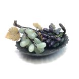 A Chinese soapstone bowl and hardstone grapes.