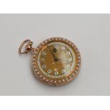A 19th century key wind blue enamel and pearl set gold fob watch,