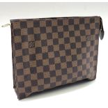 A Louis Vuitton toiletry bag, chequer pattern with coated red canvas lined interior, height 23cm,