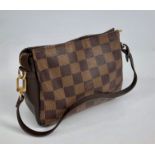A Louis Vuitton purse bag, chequer pattern with brown leather strap and trim,