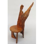 A rustic side chair, with mahogany circular seat, height 101cm.