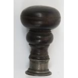 An 18th century turned wood and silver seal, height 6 cm.