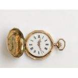 A keyless Art Nouveau enamelled 14ct gold full hunter cased fob watch,