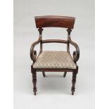 A William IV mahogany open armchair, with a horizontal bar splat and solid arms,