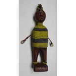 An African wooden Namji tribal beaded fertility figure, Cameroon, height 30cm width 6cm.