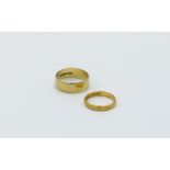 A 22ct gold band 3.1g and an 18ct gold band 5.2g.