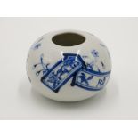 A Japanese blue and white water pot, height 6cm.