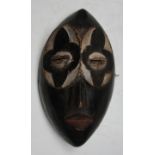 An African wooden Bembe tribal mask, Congo, height 27cm width 16cm.