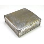 A silver electroplate on brass cigarette box, the lid decorated with "WWII Battle Fields of Europe",
