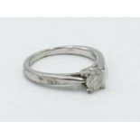 A solitaire diamond ring of approx 0.5ct set in white gold.