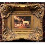 A print of three dogs in deep moulded frame,