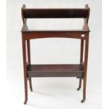 An Edwardian mahogany book rack, height 85cm, width 56cm.