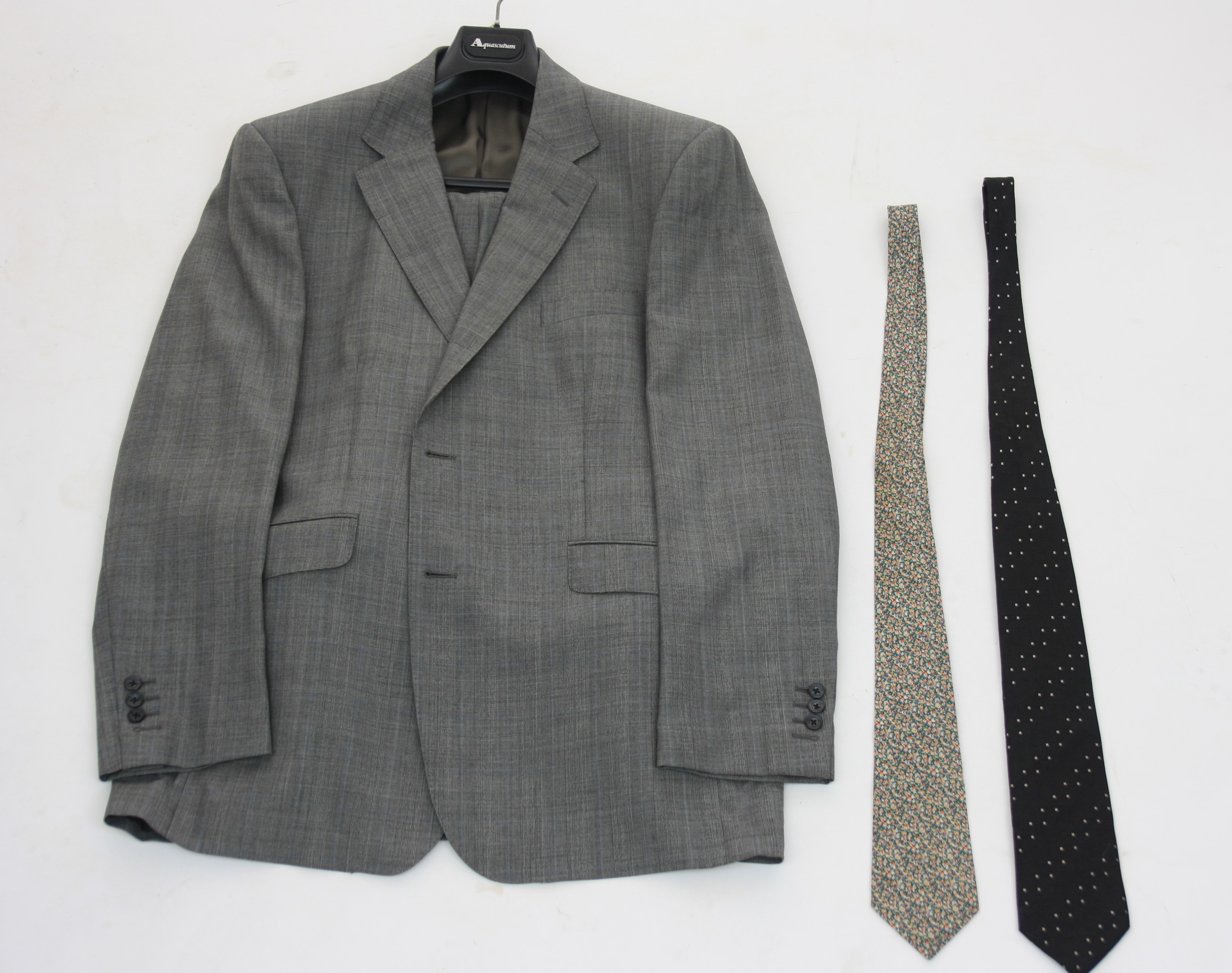 An Aquascutum mens suite, a Liberty tie and one other tie.