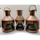 A set of three Griffiths & Sons copper ships navigation lamps, inscribed Port,