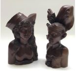 Two Burmese carved wood busts, heights 38.5cm and 33cm.