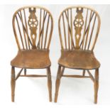 A pair of elm and beech kitchen chairs, 19th century,