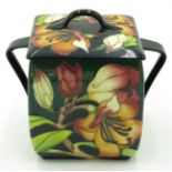 A Moorcroft pottery box and cover,