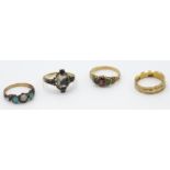 Four 19th century gold rings, three stone set, the fourth an 18ct gold band.