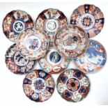 Ten miscellaneous Japanese imari plates.