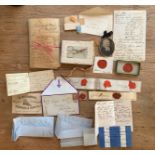 A collection of 18th century and early 19th century notes, receipts, lists, stamps,