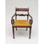 An early Victorian mahogany open armchair, height 85cm, width 55cm.