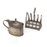 A late Victorian oval section mustard and a small silver toast rack.