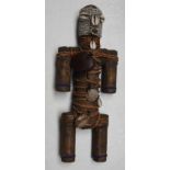 An African wooden Namji beaded tribal figure, height 30cm width 12cm.