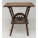 A Victorian carved oak two tier occasional table, height 66.5cm, width 61cm, depth 43cm.