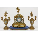 A French gilt metal and porcelain clock garniture, late 19th century,