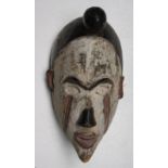 An African wooden Bakongo tribal mask, Congo, height 35cm, width 18cm.