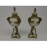 A pair of French marble and ormolou large urns, late 19th century, with fixed covers,