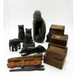 An African carved soapstone figure, 26cm, other carvings, boxes etc.