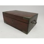 An Indian teak and brass bound box,