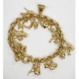 A 9ct gold charm bracelet, 17.1g.