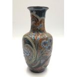 A large Doulton Lambeth stoneware vase, decorated with flowers in Art Nouveau swirling designs,