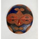 An African wooden Bateke tribal mask, Gabon, height 30cm diameter 28cm.