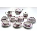 A German porcelain part tea service, 18th century, floral decorated in purple and gold,