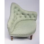 A Victorian green upholstered corner seat, with turned mahogany legs, height 89cm.
