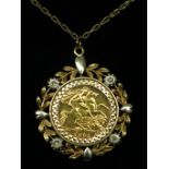 A 1982 half sovereign in 9ct two colour gold diamond set pendant mount on fine gold chain, 9.5g.