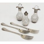Three mid 18th century Old English table forks and three silver mounted cut glass condiment bottles.