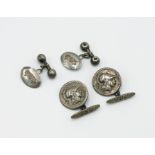A pair of silver cufflinks with imitation Greek coins,