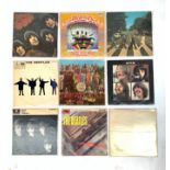 The Beatles - 8 vinyl LP records; "White Album" No. 0571150, with 4 photos & poster.
