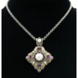 A Russian silver pendant set with "pearls" and amethyst on silver chain.