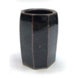 A Leach tenmoko glaze octagonal vase, pottery and potter's mark to base, height 9cm.