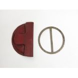 A George III brass protractor, 8 cm, red leather case with two pairs of steel dividers,