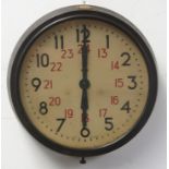 A British Rail bakelite circular wall clock, with 12 and 24 hour marked dial, labelled BR-W 5897,