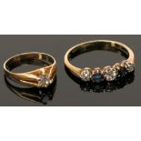 A small high purity ring set a diamond and an 18ct gold ring set three diamonds and two sapphires.